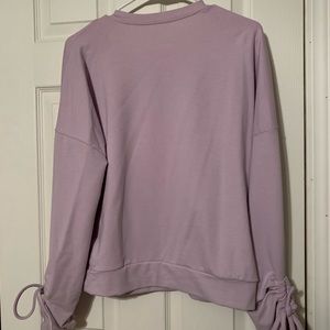 Small lavender sweatshirt never worn